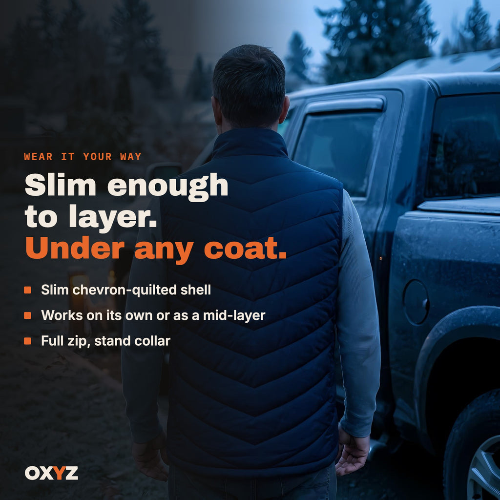 Slim heated vest that layers under a coat
